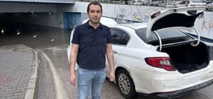 Adana'da sağanak sonrası alt geçidi su bastı; otomobilde mahsur kaldılar